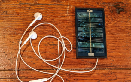 solar panel attached to headphones